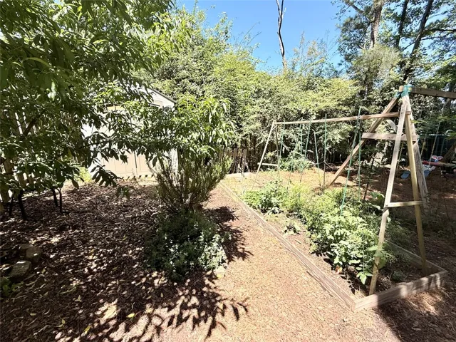 Cultivate your green thumb in this vibrant garden area, perfect for outdoor enjoyment and fresh produce.