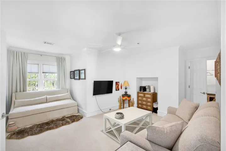 This room is currently set up as a living space but is perfect for a bedroom as well.  It's bright and inviting, perfect for relaxation or a quiet retreat.
