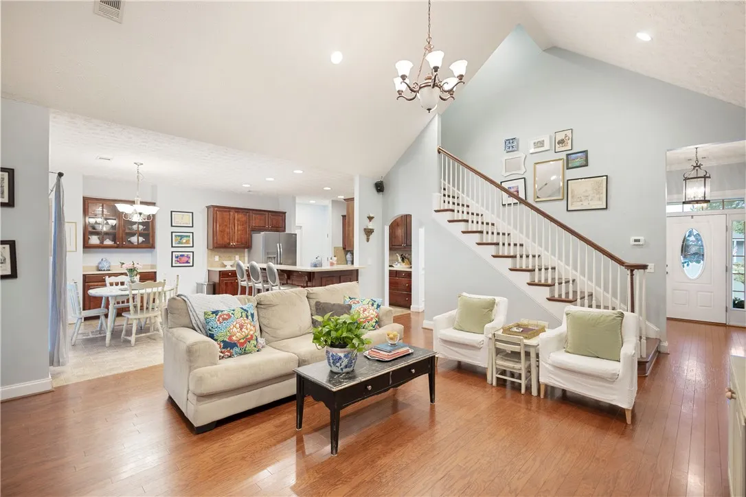 This inviting home offers an open floorplan with rich hardwood floors and a grand staircase.