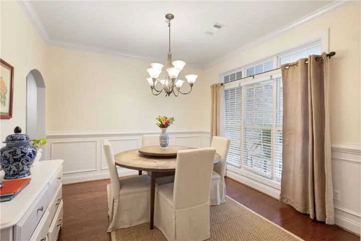 This dining room offers a warm ambiance, perfect for intimate gatherings or celebratory meals.