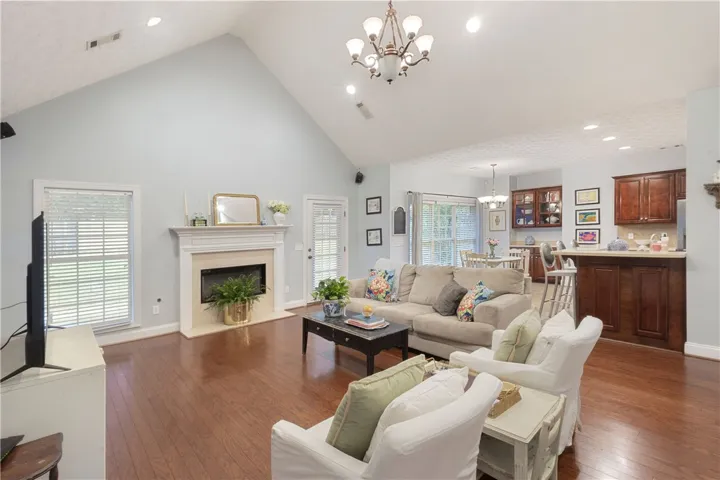 This inviting space offers an open layout, ideal for daily living and entertaining.