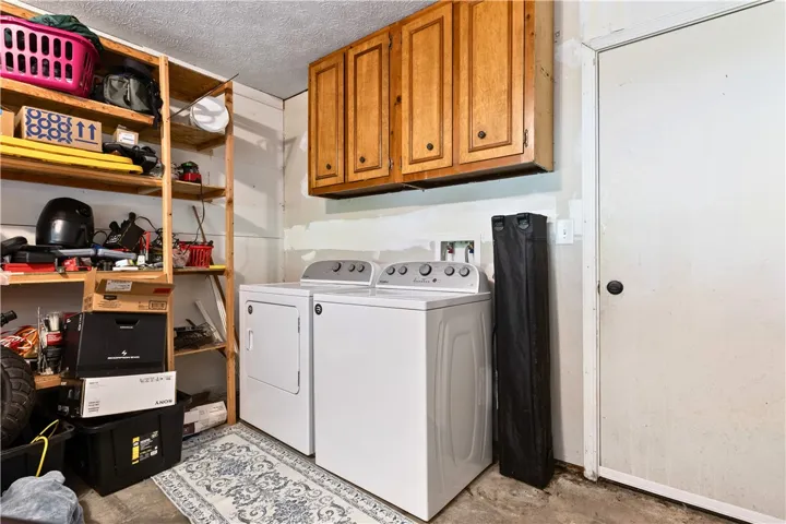 Laundry area has been relocated to the garage adjacent kitchen/pantry.  This space was ducted and can be conditioned.