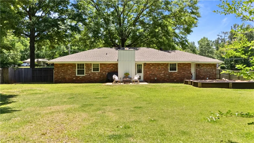 Expansive back yard to run & play!  Back patio & raised garden too!