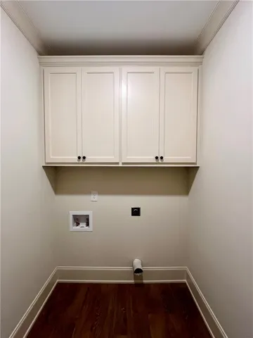 Laundry Room W/ Upper Cabinetry & W/D Connection