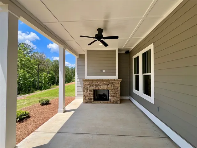 Expansive Rear Porch W/ Stone Fireplace!