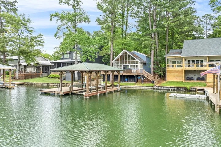 Lakeside retreats with private docks offer direct water access and wooded serenity.