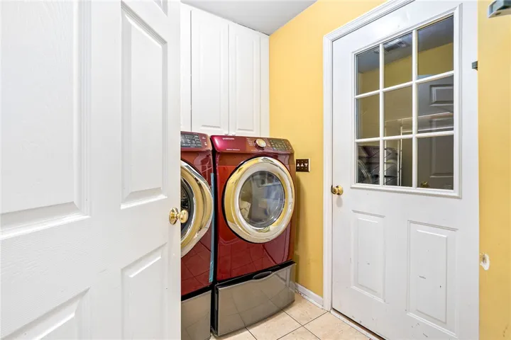 This practical laundry area combines efficiency with clean design, offering convenience.