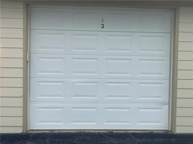 This clean garage provides secure parking and storage.