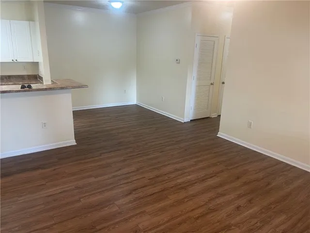 This inviting space features durable flooring and abundant natural light.