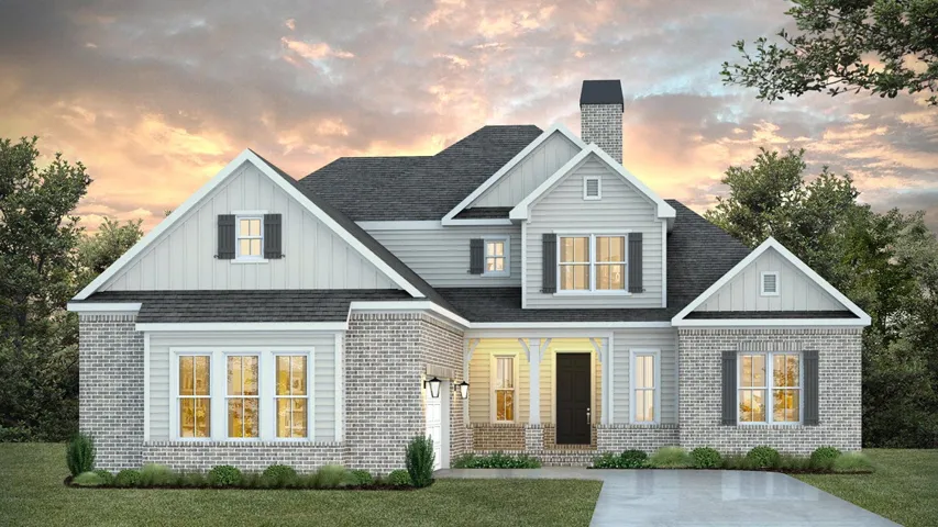 This charming residence features classic architecture, a well-manicured lawn, and an inviting entryway.