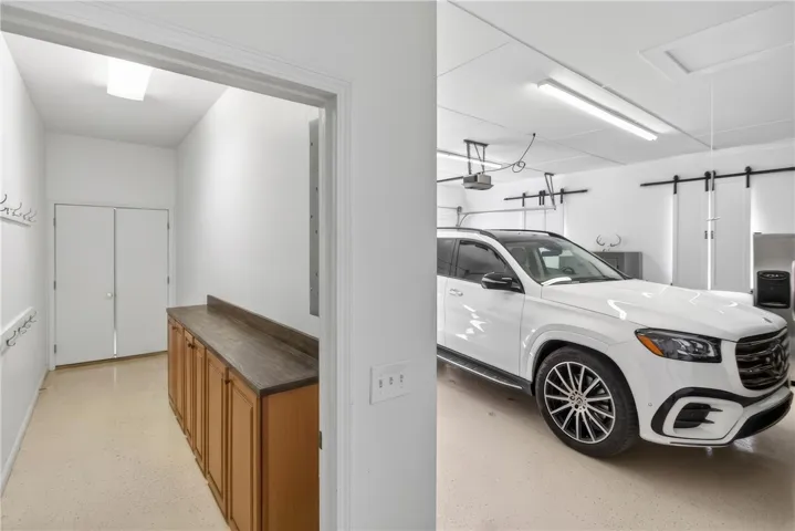 Secure parking and organized storage spaces enhance this functional garage.