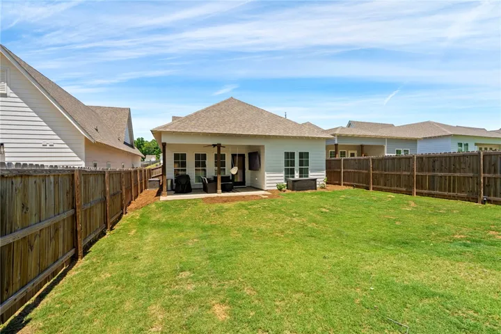 The perfect yard for entertaining, play and your favorite four legged friends!