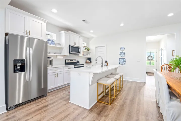 A spacious center island provides additional seating and functionality