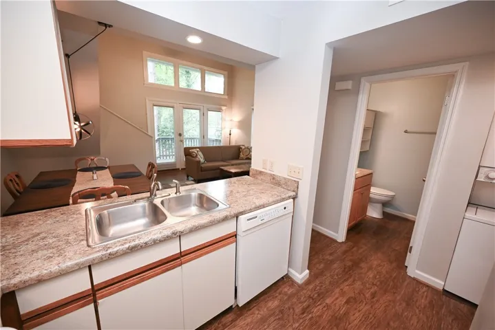 A well-appointed kitchen flows into the dining and living spaces, offering seamless entertaining.