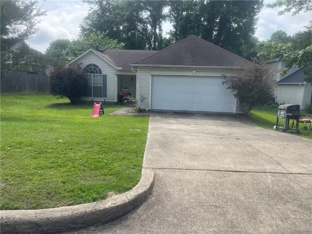 A classic facade with a welcoming front yard, this home offers inviting curb appeal.