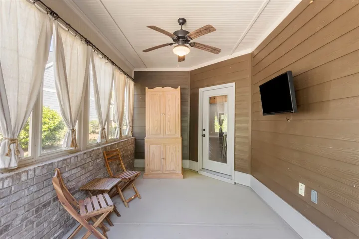 An inviting screened porch for year-round enjoyment.