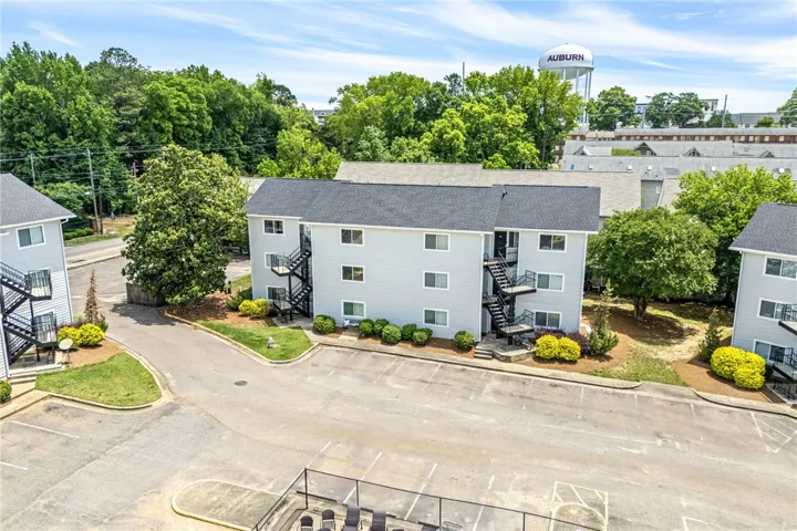 A quiet complex with ample parking and inviting greenspace, perfect for comfortable living.