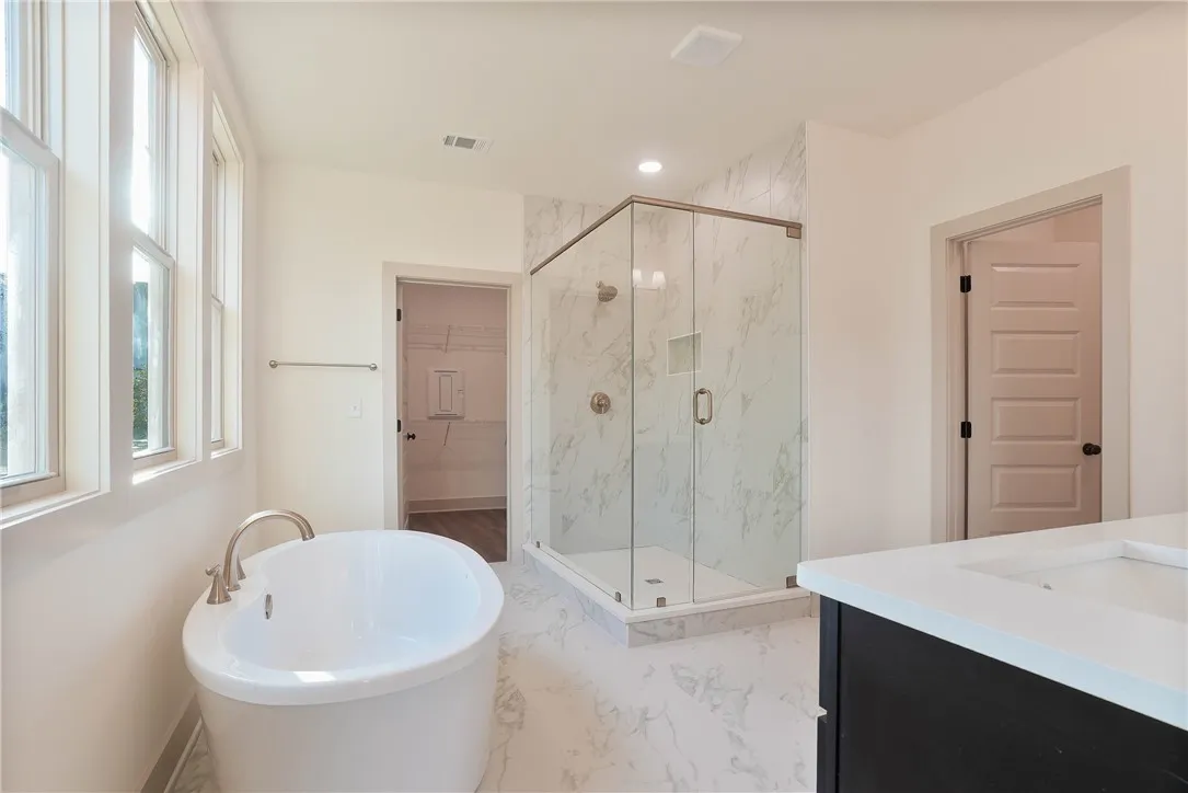 Primary Bathroom - Full Tile Shower, Soaking Tub, & Double Vanities