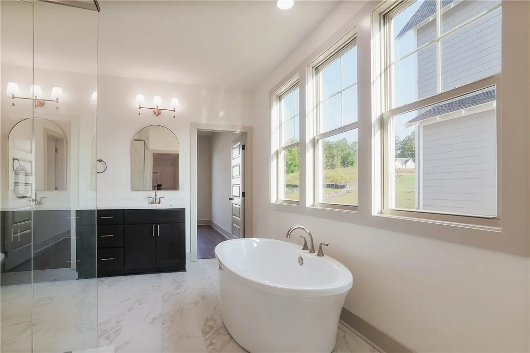 Primary Bathroom - Full Tile Shower, Soaking Tub, & Double Vanities