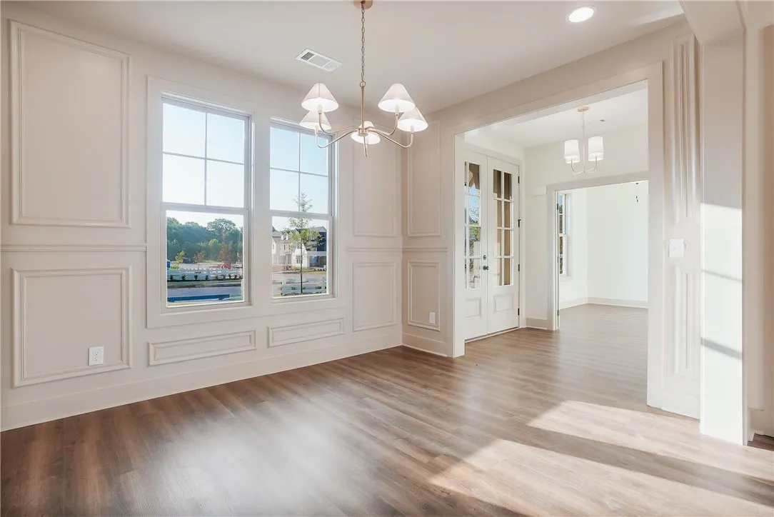 Alternate View of Dining Room, Front Entry, & Study