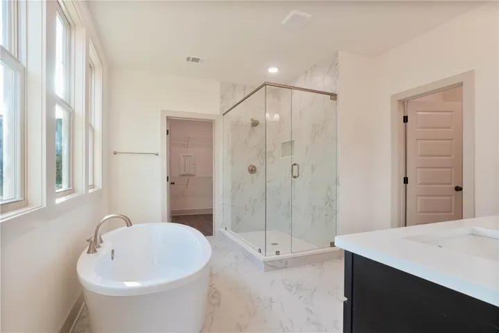 Primary Bathroom - Full Tile Shower, Soaking Tub, & Double Vanities