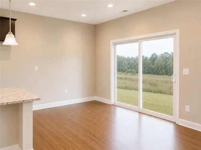 A sliding glass door leads to the rear patio.