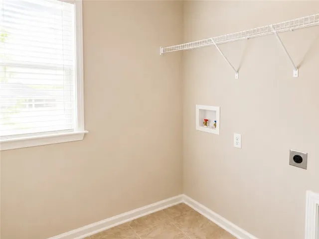 The laundry is conveniently located near all bedrooms.