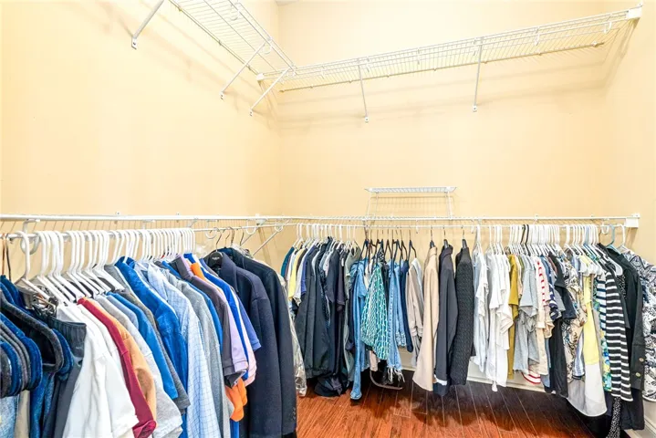 Ample storage solutions are provided by the well-organized wire shelving in this practical closet space.