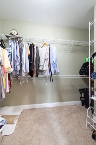 Ample closet storage solutions keep everything organized and easily accessible.