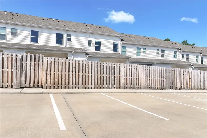 Attached multi-unit residences offer private fenced yards.
