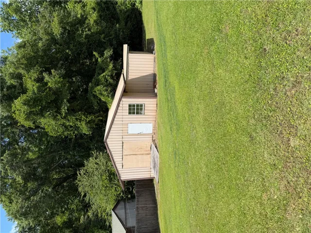 A valuable storage shed offers practical utility and convenient access on this property.