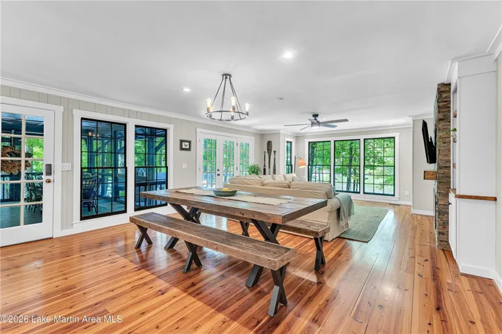 Warm hardwood floors and an open concept layout define this inviting living space.