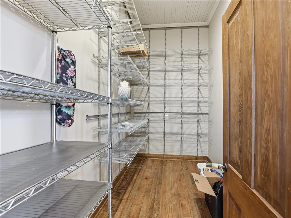 Ample storage solutions abound within this versatile space, perfect for organization.