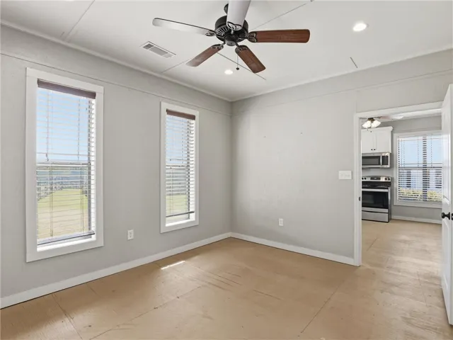 A versatile room bathed in natural light, awaiting your personal touch for ultimate comfort and style.