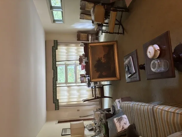 A window-filled living area offers abundant natural illumination.