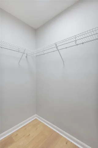 Functional wire shelving provides ample storage in this well-appointed closet.