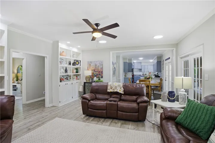 Built-in shelving and ample light define this inviting living room.