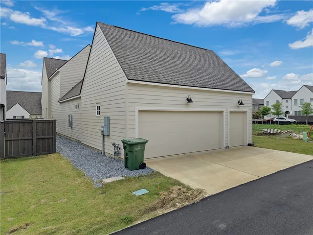 Double garage and single side garage offer ample parking and storage.