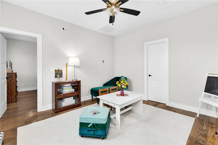 Hardwood flooring and a neutral palette offer a versatile foundation for any décor.