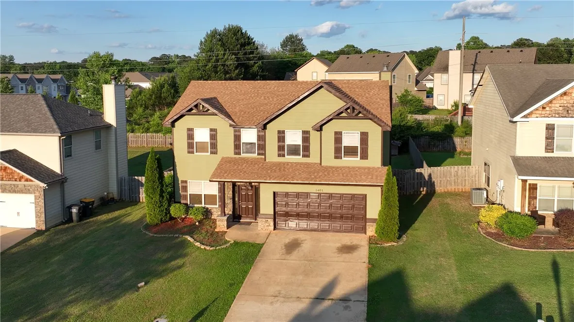 This charming home offers curb appeal and a welcoming presence.