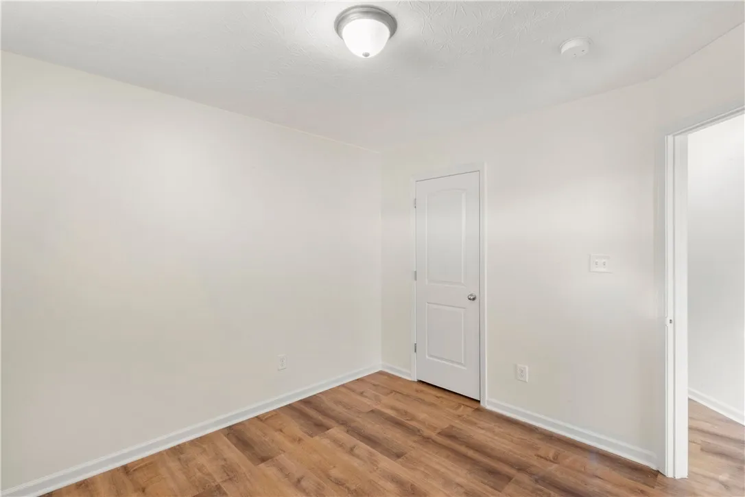 This bright room features LVP flooring ready for your personal touch.