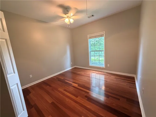 Bedroom two with a standard closet.