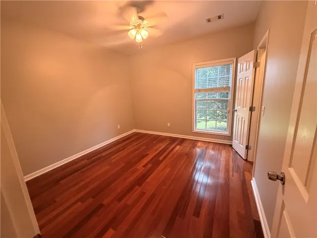 Bedroom three with a walk-in closet.