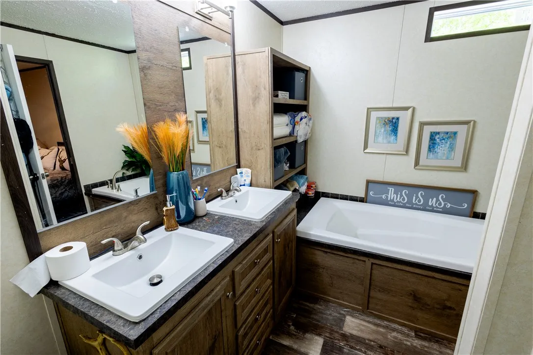 Double vanities and a soaking tub create a restful bathroom retreat.