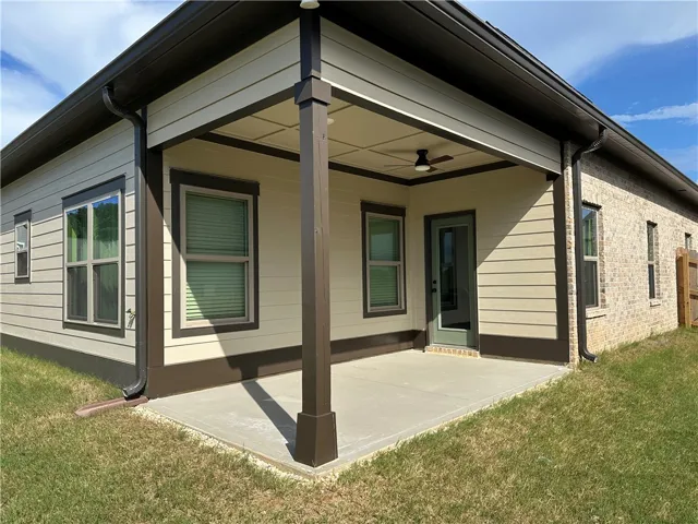 A spacious covered patio provides an ideal setting for outdoor enjoyment.