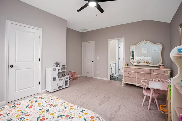 Well-lit spacious room.