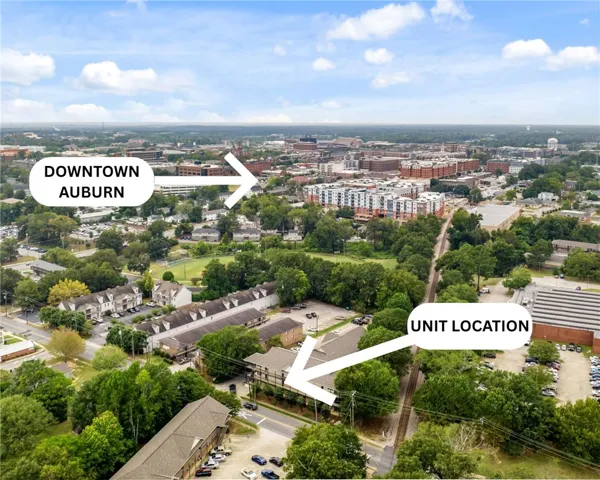 An aerial perspective reveals the property's convenient position amidst a vibrant urban landscape.