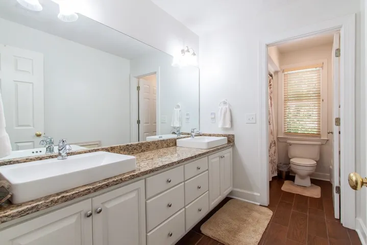The bath on the second floor features Granite counters and dual vessel sinks.