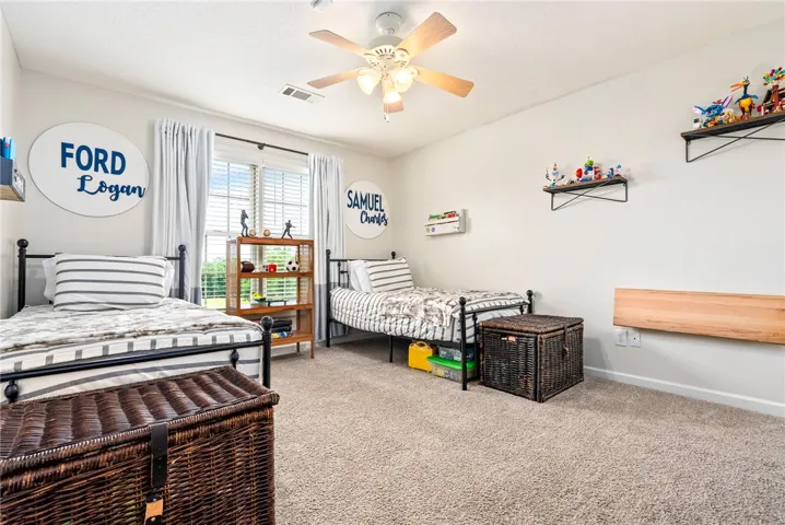 This cozy bedroom provides a comfortable and functional living space for residents.