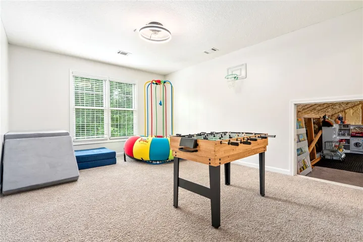 A versatile bonus room offering recreation and flexible space.